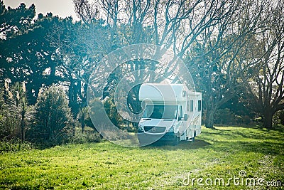 motorhome on a camping ground, caravan vacations, campervan trip Editorial Stock Photo