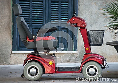 Motorized wheelchair car. Stock Photo