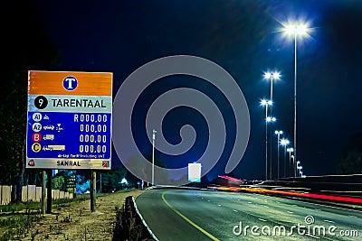 Motorway Signs on Highway at night Editorial Stock Photo