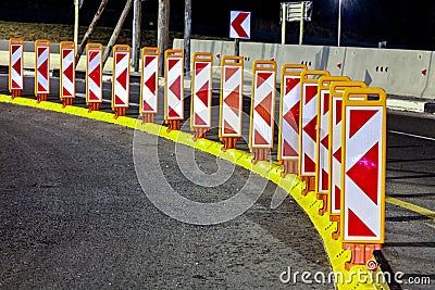 Motorway Signs and reflectors on Highway at night Stock Photo