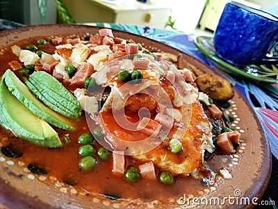 Motuleno style eggs, classic yucatecan Mexican breakfast motuleno motuleÃ±os style eggs Stock Photo