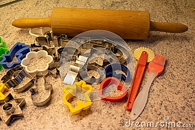 Moulds, hearts, flour and dough for Christmas biscuits Stock Photo