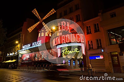 Moulin Rouge is a famous cabaret and thater in Paris, France Editorial Stock Photo