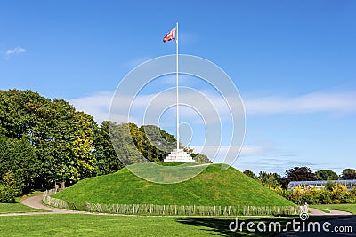 The Mound artificial hill wiith a tall flagpole in Duthie Park, Aberdeen Stock Photo
