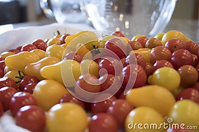 Mound of Cherry Tomatoes on Kitchen Counter Stock Photo