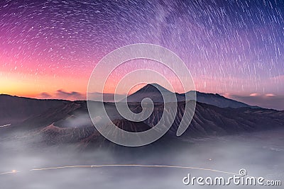 Mount active volcano, Batok, Bromo, Semeru with starry and fog a Stock Photo