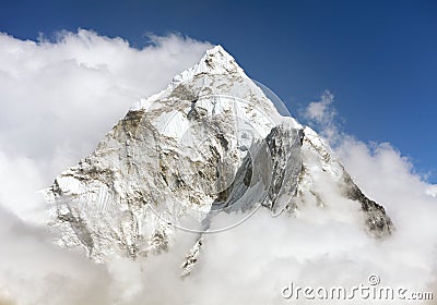 Mount Ama Dablam within clouds Stock Photo