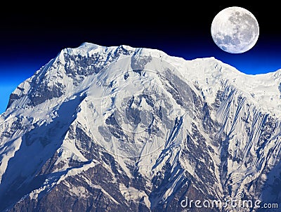 Mount Annapurna South and the Moon Stock Photo