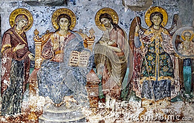 Mount Athos, Greece - October 26, 2017: Timeworn frescoes of saints on the outer side of the Church of Protaton in Karyes, Mount Editorial Stock Photo