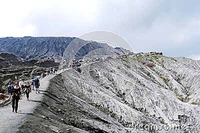 Mount Bromo volcano during fog and cloud season. Mount Penanjakan in Bromo Tengger Semeru National Park, East Java, Indonesia Editorial Stock Photo