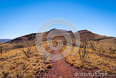 Mount Bruce hiking path leading towards the mountain top Karijini National Park Stock Photo