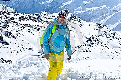 Mount Elbrus with ski slopes. Caucasus snowy mountains. Alpine skiing in the fresh air. skiers in the snow. mountain snowy landsca Stock Photo