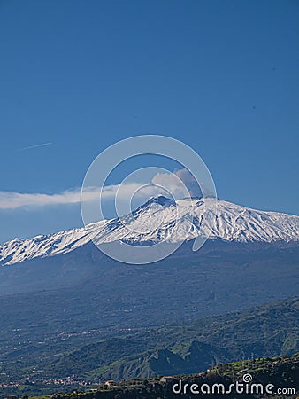 Mount Etna volcanic smoke at sunset. Sicily, Italy Stock Photo