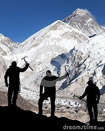 Mount Everest from Kala Patthar and silhouette of men Editorial Stock Photo