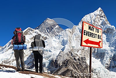 Mount Everest from Kala Patthar with two tourists Editorial Stock Photo