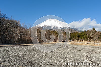 Mount Fuji snow covered in winter with white clouds and blue sky Stock Photo