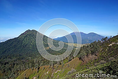 Mount Ijen is a volcano located on the border of Banyuwangi Regency and Bondowoso Regency,East Java. Stock Photo