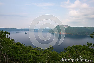 Mount Kamui and the beautiful clear blue Lake Mashu Stock Photo
