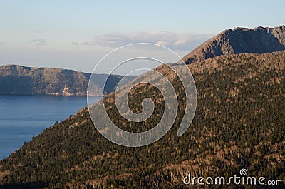 Mount Kamui rising above Lake Mashu Stock Photo