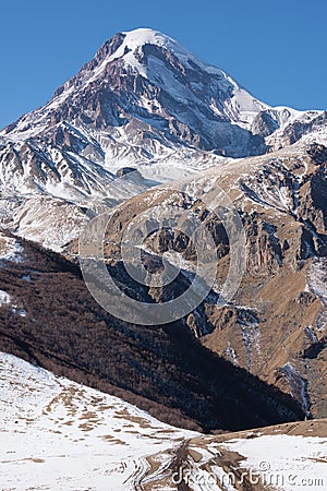 Mount Kazbeg and the Caucasus Stock Photo