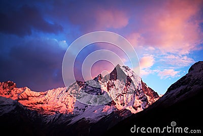 Mount Machapuchare (Fishtail) at sunset, view from Annapurna base camp Stock Photo