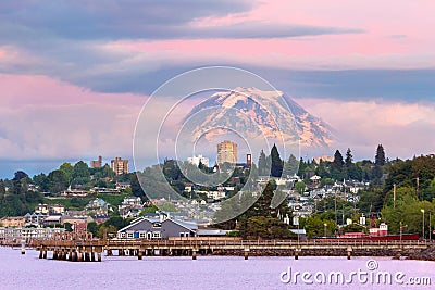 Mount Rainier over Tacoma Waterfront at Dusk in Washington state Stock Photo