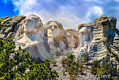 Mount Rushmore, cloudy with blue skies Stock Photo