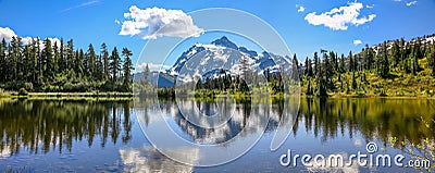 Mount Shuksan with reflections in Picture lake in Mount Baker recreation area in Washington Pacific Stock Photo