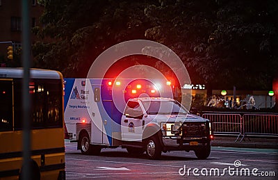 Mount Sinai Ambulance, Emergency Medical Service, in mission going to save people. Red lights on. Editorial Stock Photo