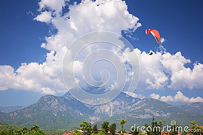 The Mount Tahtali in sunny day with paraglider near Tekirova, Turkey Stock Photo