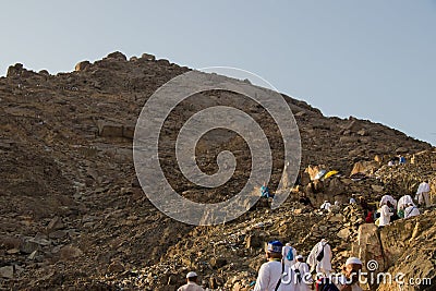 Mount Thawr. Muslim pilgrims climb the Mount Thawr where located the Thawr Cave. Mecca - Saudi Arabia: August 2018 Editorial Stock Photo
