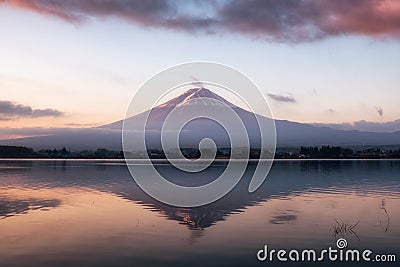 Mount volcano Fuji-san warmth reflection Kawaguchiko Lake at sun Stock Photo