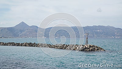 Mountain and Beach landscapes in Heraklion City on Crete Island with yachts and boats in Greece. Stock Photo