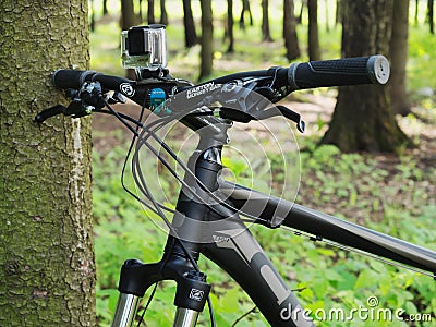 Mountain bicycle by CUBE with GoPro 3+ BE mounted on handlebar Editorial Stock Photo