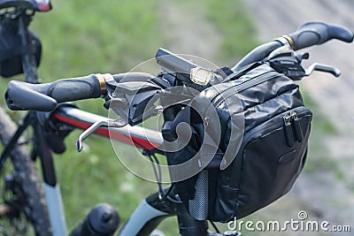 Mountain bike with a bag on the handlebars Stock Photo