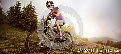 Mountain Bike cyclist riding single track. Stock Photo