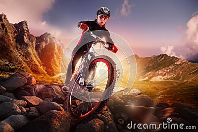 Mountain Bike cyclist riding Stock Photo