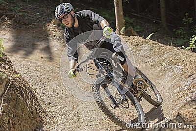 Mountain bike rider gravity slope front Stock Photo