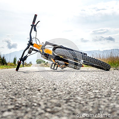 Mountain bike stretched on the ground without people Stock Photo