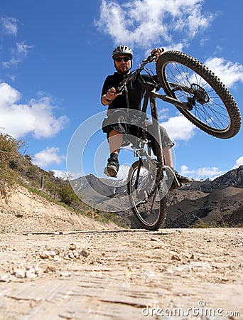 Mountain biker in action Stock Photo