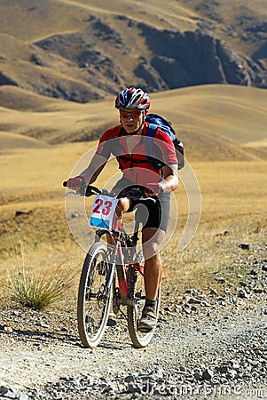 Mountain biker on desert race Stock Photo