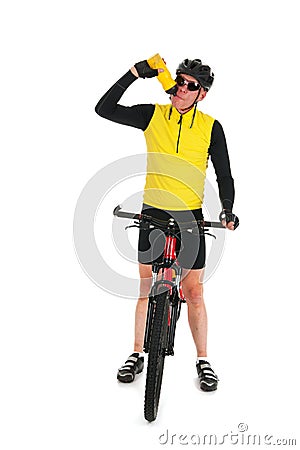 Mountain biker drinking water in studio Stock Photo