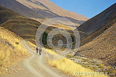 Mountain bikers biking in Alborz mountains Stock Photo