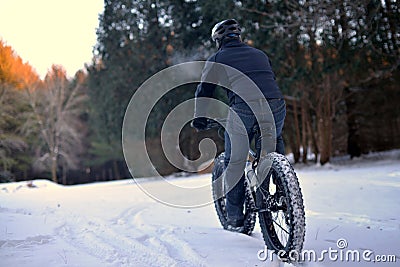 Mountain Biking in the Snow Editorial Stock Photo