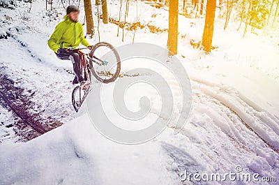 Mountain biking in snowy forest Editorial Stock Photo