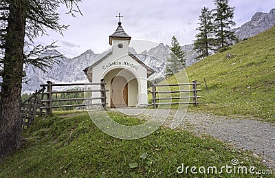 Mountain chapel in the Austrian mountains Stock Photo
