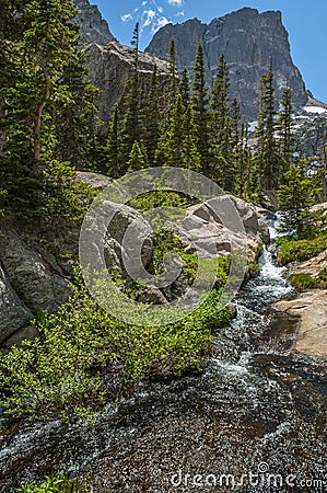 Mountain Creek with Hallett Peak in the background Stock Photo