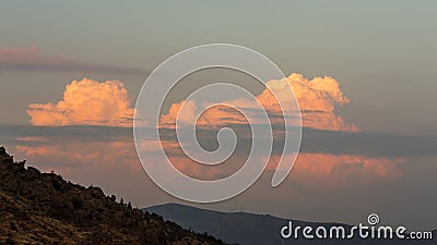 Mountain and Crimson Clouds Stock Photo