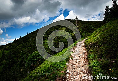 Mountain gravel trail up to the cloud Stock Photo