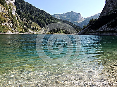 Mountain lake krn in the alps Stock Photo